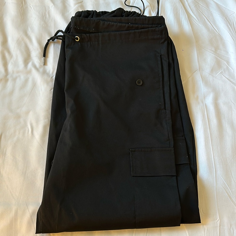Black parachute pants